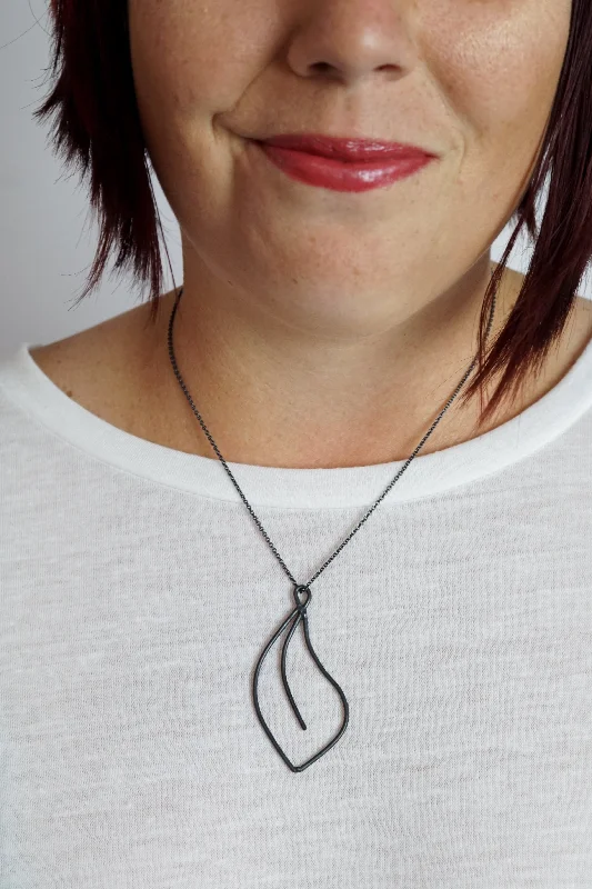 women beautiful necklaces -Flourish Necklace in black steel, silver, or bronze