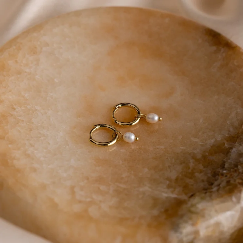 women sparkling gold earrings -Dainty Pearl Huggies